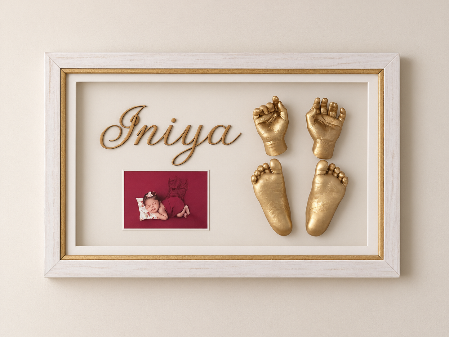 Personalized white and gold baby shadow box with castings and a photograph